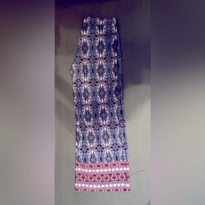 Cato swing-leg pants with stretch waistband. Navy and coral pattern.